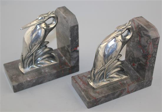 A pair of heron bookends & pair toucan bookends